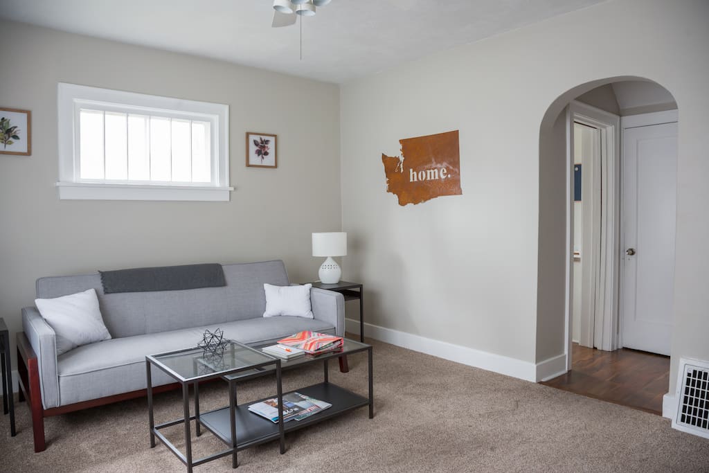 Main floor living room with sofa-bed
