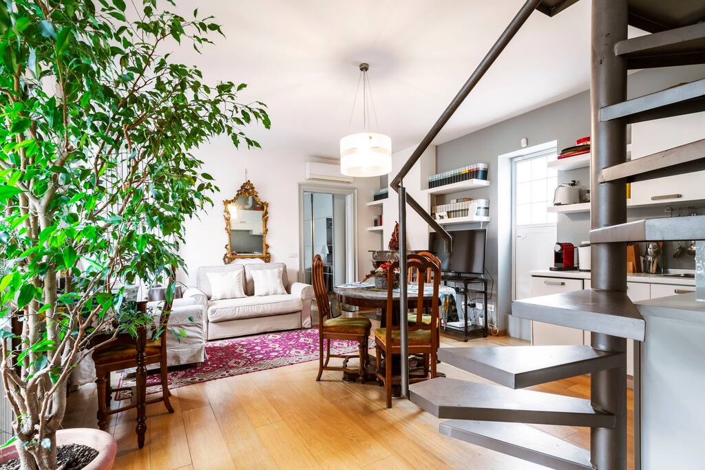 Living area and staircase to second level