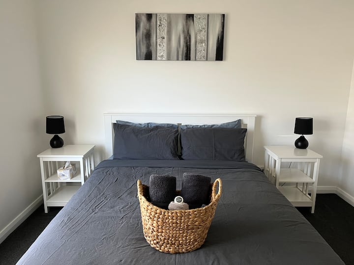 Cama tamaño queen