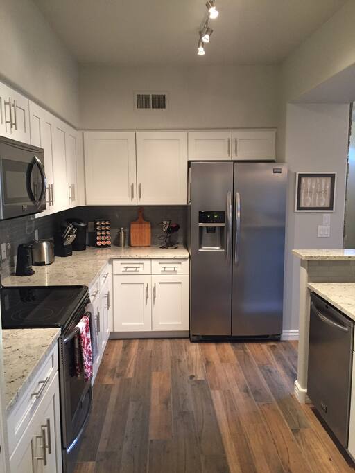 Stainless steel appliances and soft close drawers and cabinets.