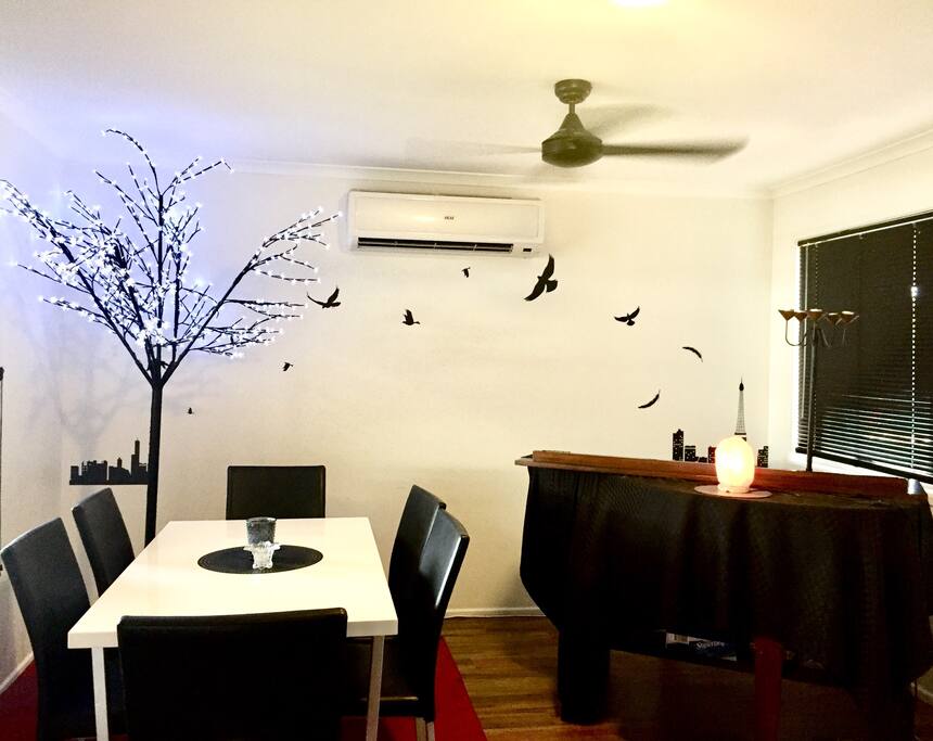 Living rooms are for living, eat, chill, play the piano or use the dinning table as a work space.