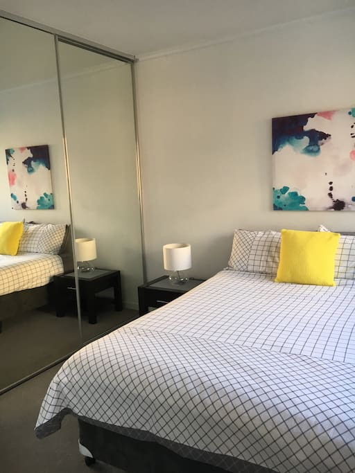 Queen size bed with ample wardrobe hanging space