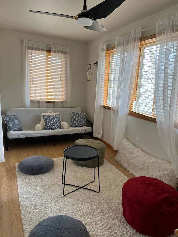 The Den / Zen room (Bedroom #4) in the primary suite with remote control candles & futon / pull out bed.