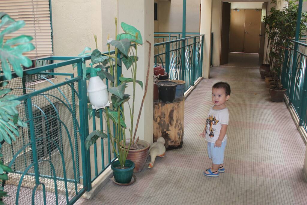 In front of the house.