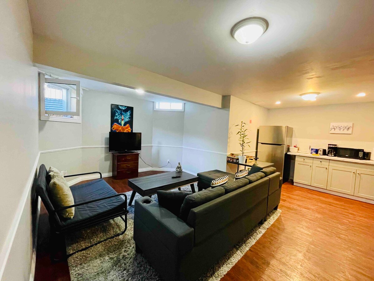 Spacious 2 bedroom basement apt & 1 parking spot Guest suites for