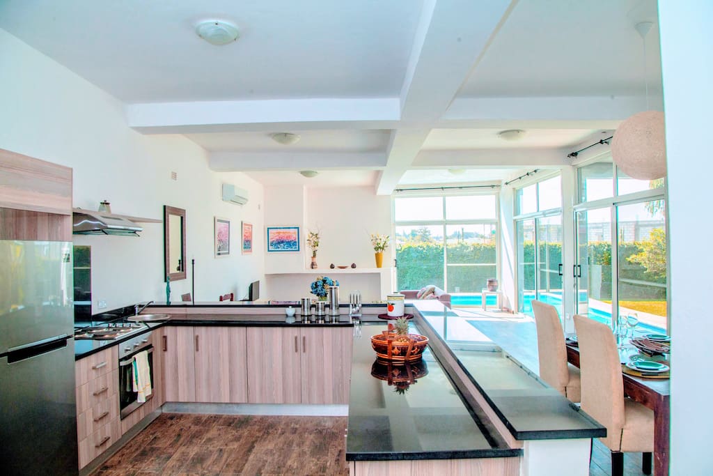 Open plan kitchen and scullery: Dishwasher and washing machine