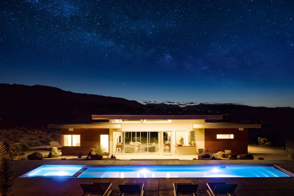SkyHouse sits at the top of a hill, nested in the desert with night time views of the milky way.