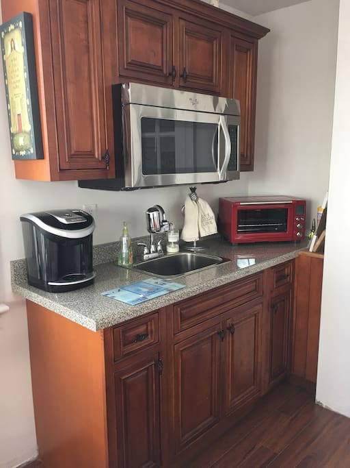 Kitchenette with full refrigerator
