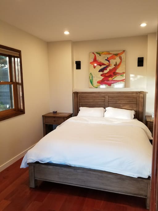 queen bed Ethan Allen and recessed lights, window with blind