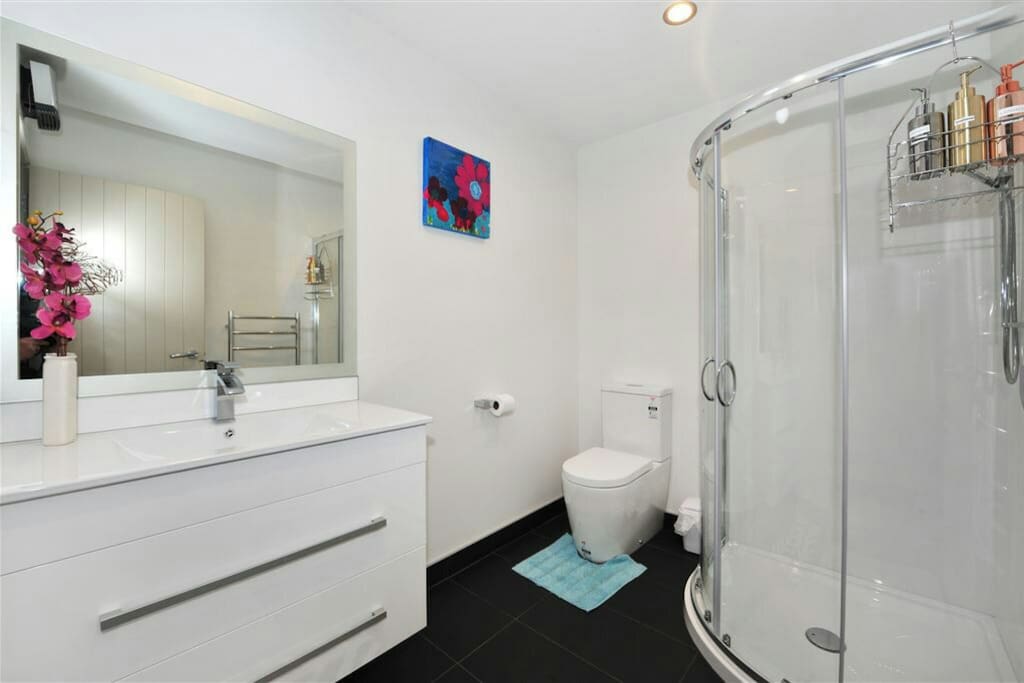 Bathroom 2-with shower, toilet, vanity, heated towel rail and bathroom fan heater