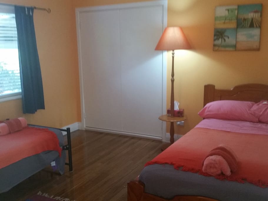 Colourful California Room with king single beds