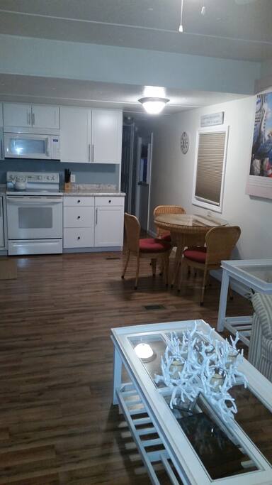 Clean kitchen with dishwasher, coffee maker, sodastream & more
