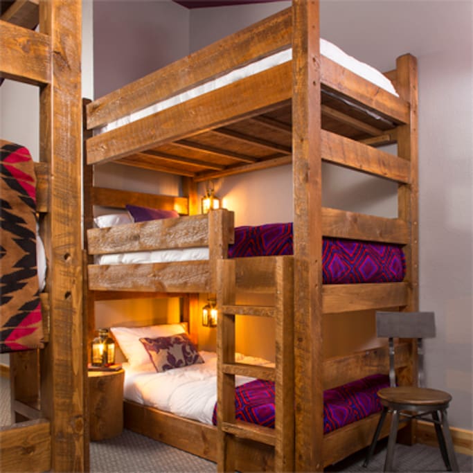 Norwegian Pine Bunks with power outlets and reading lanterns.