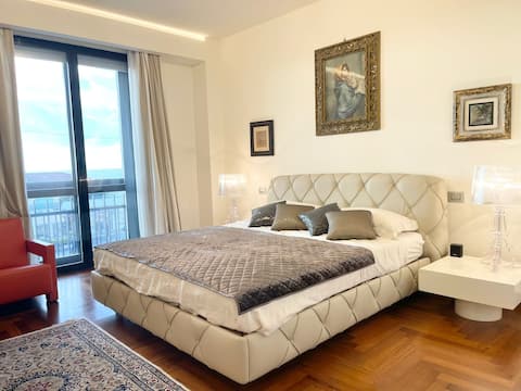 Beachfront apartment with private parking