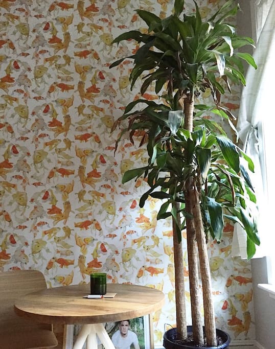 Small breakfast table by a window for some work or a morning coffee