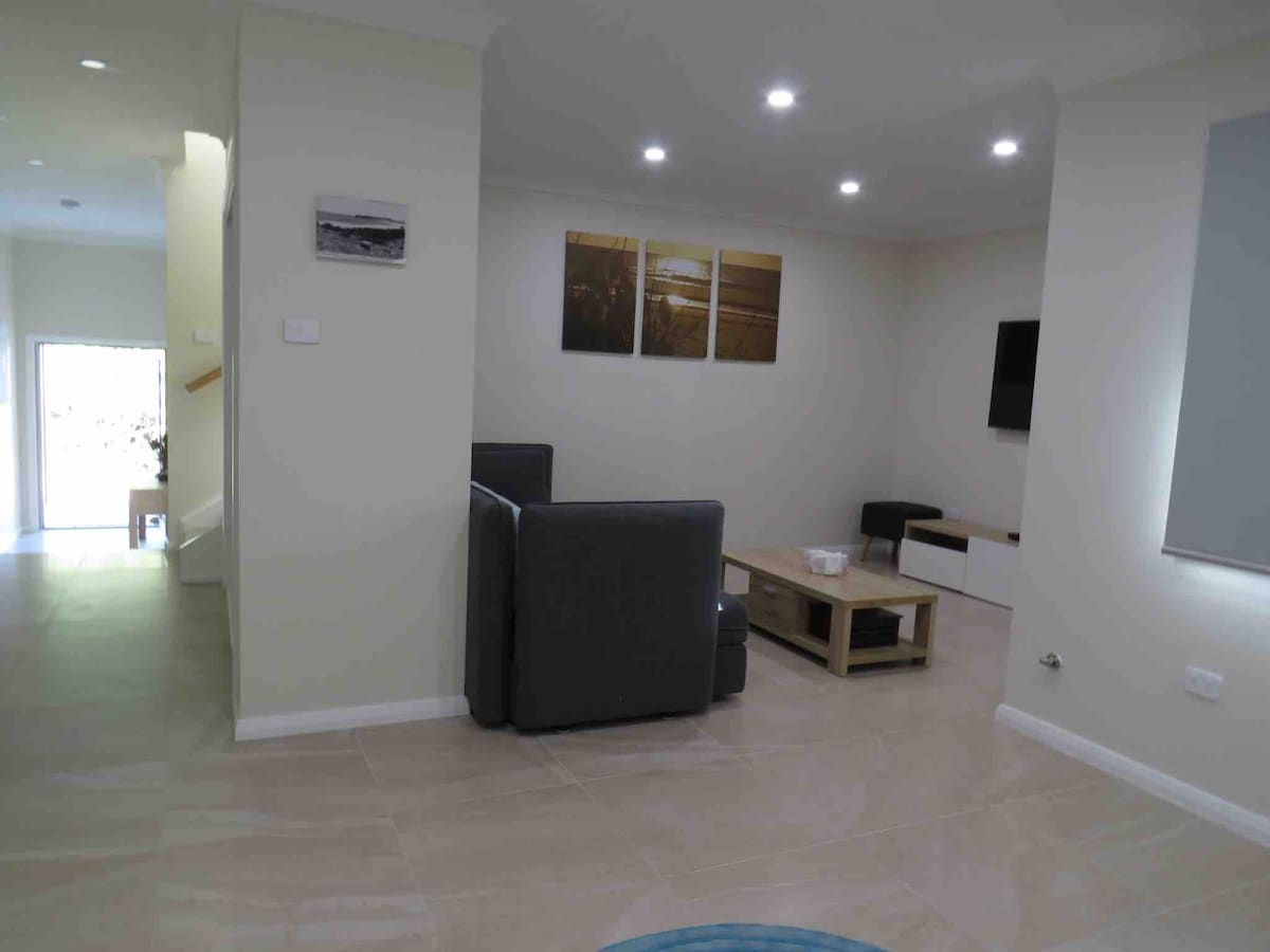 The downstairs living area is the perfect escape for the kids or a second family.