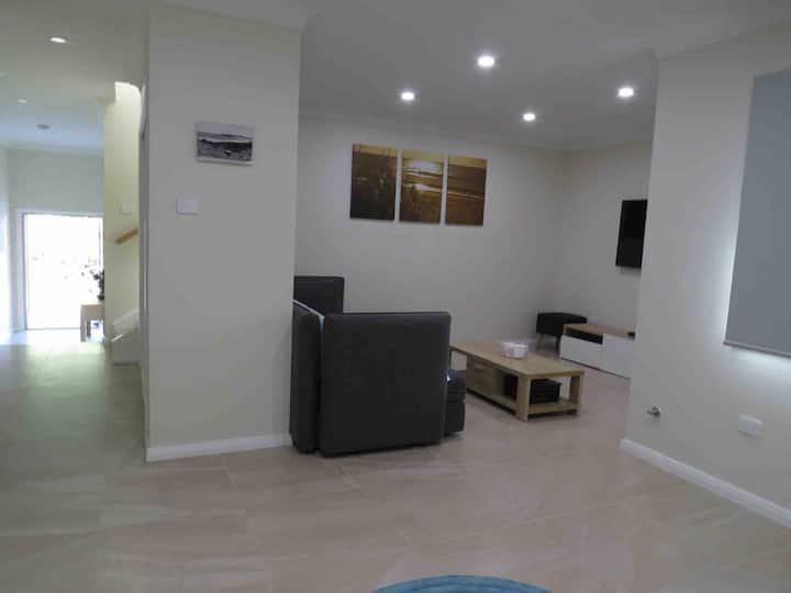 The downstairs living area is the perfect escape for the kids or a second family.