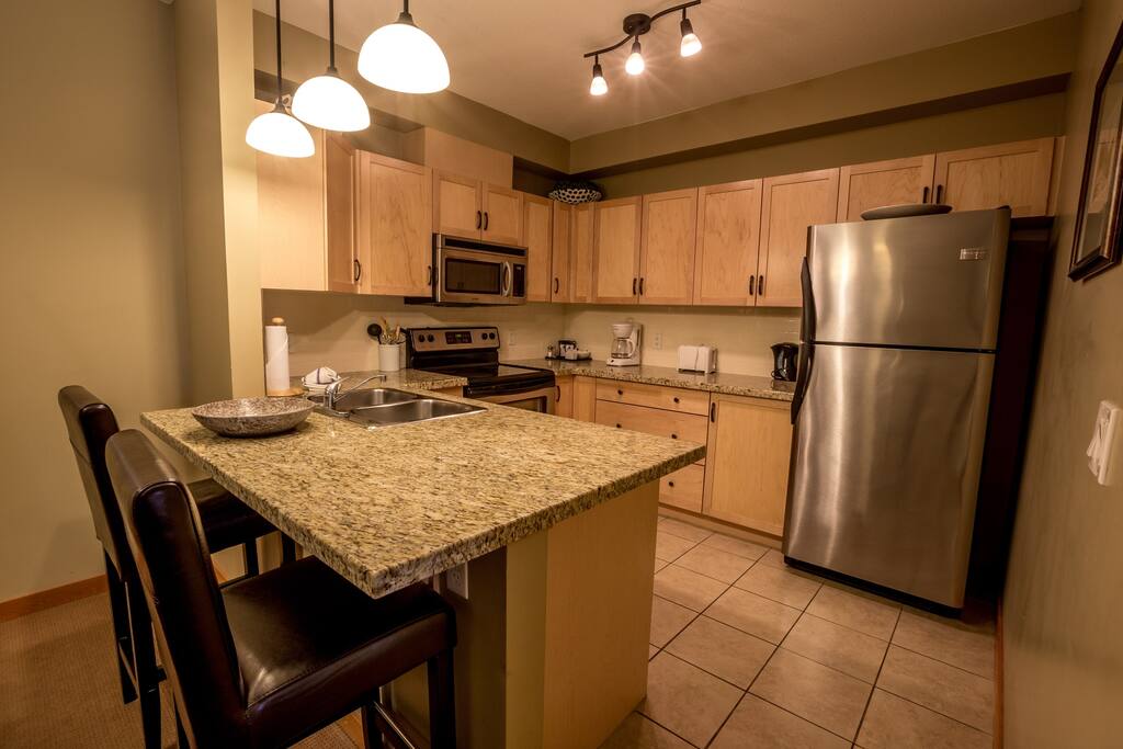 Modern and spacious kitchen with a breakfast bar