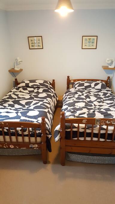 The second bedroom. Spare mattresses under the bed.