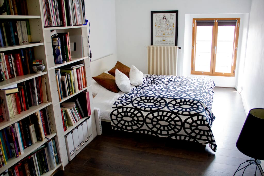 Comfortable king size bed and lots of wine literature
