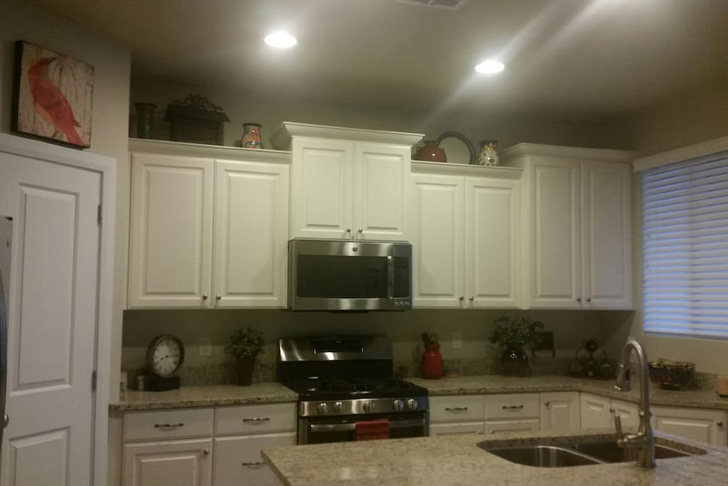Kitchen. Granite counter tops and stainless appliances.
