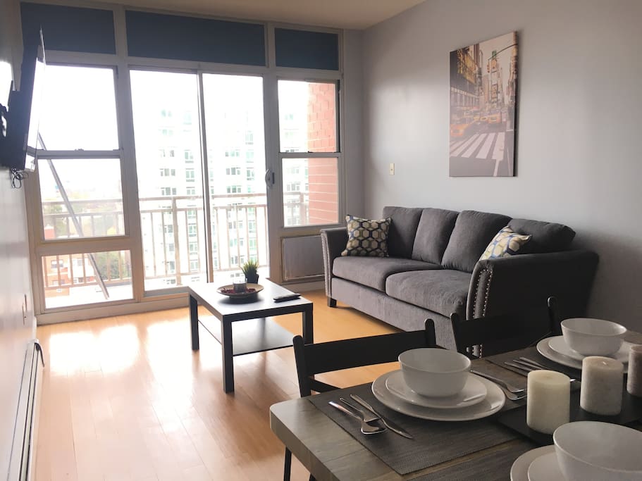 Spacious Living room/Dining room with balcony and view to Downtown Flushing
