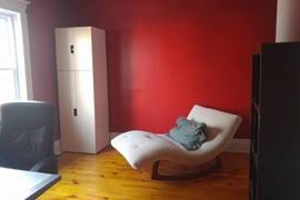 2nd bedroom with blow up double mattress (bed not shown) Lounger chair will be in the room as well. Large desk is to the left