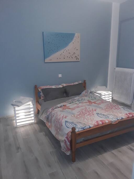 NEW floor in master bedroom. Also there is a large sliding window that looks out onto patio with privacy shutters.