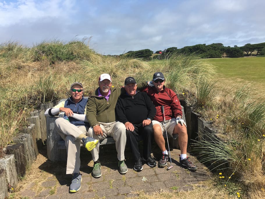 The boy’s having a great game of of golf at Bandon Dunes.