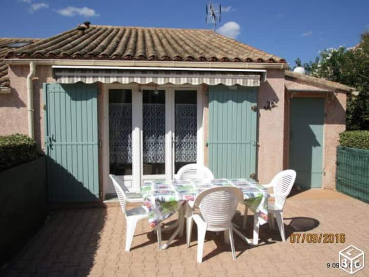 Small house in a residence with pool