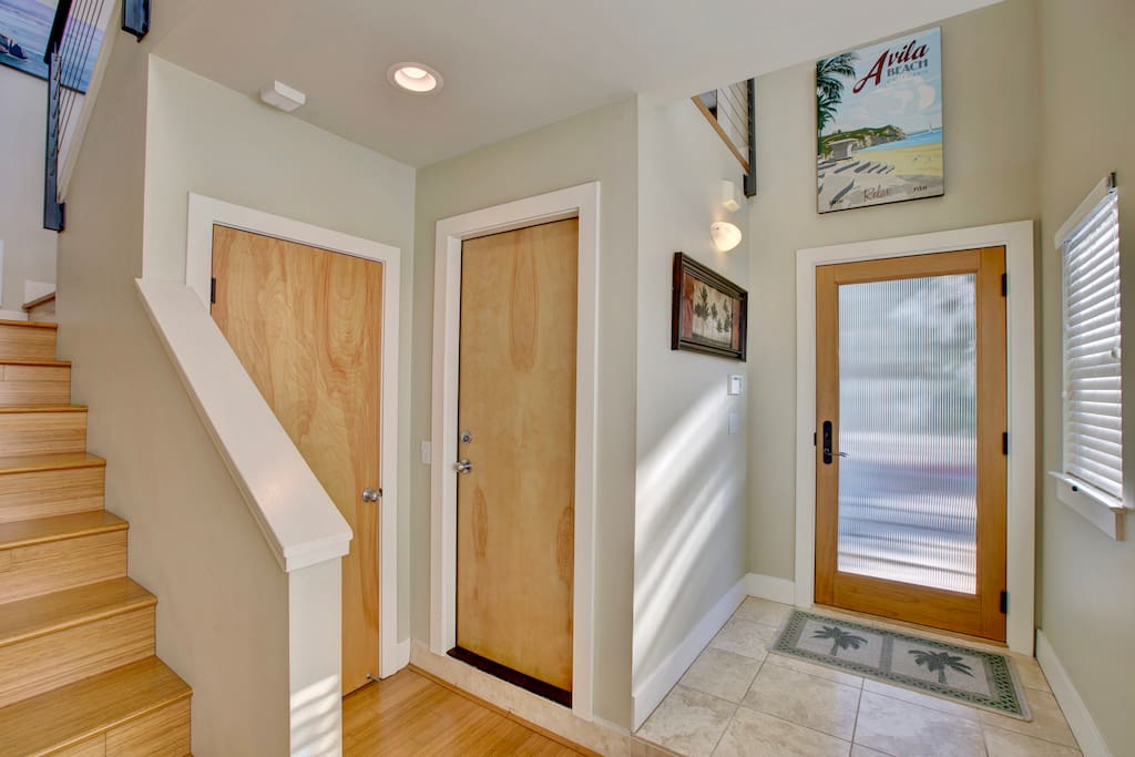 Entry to Avila Beach Escape. Access to attached single car garage and laundry center.