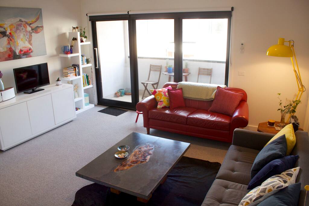 Comfortable open living with balcony