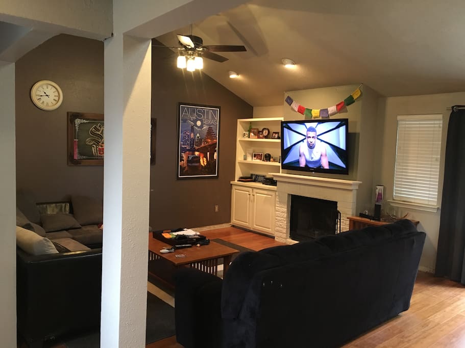 View of Living room with wood burning fireplace