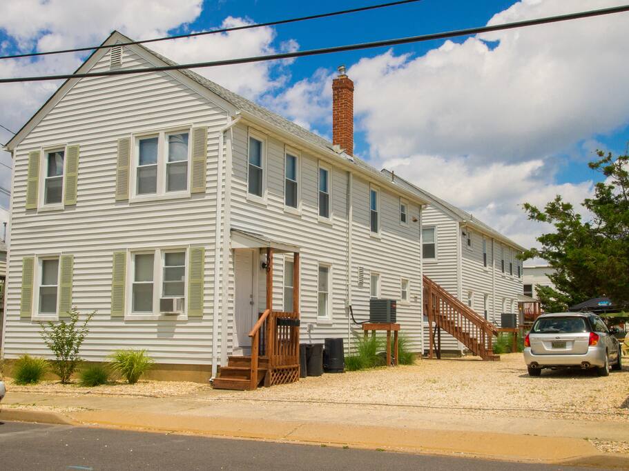 Our property from the street, the rental apartment is the first floor of the front building.