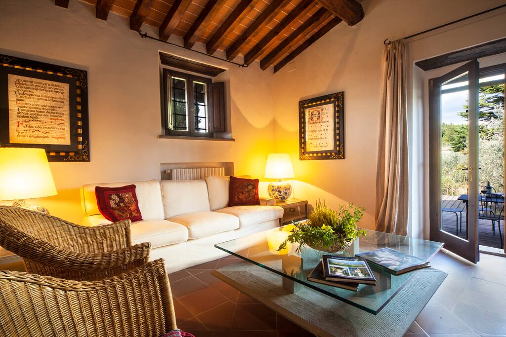 Plush sofa seating with natural light and direct outdoor access