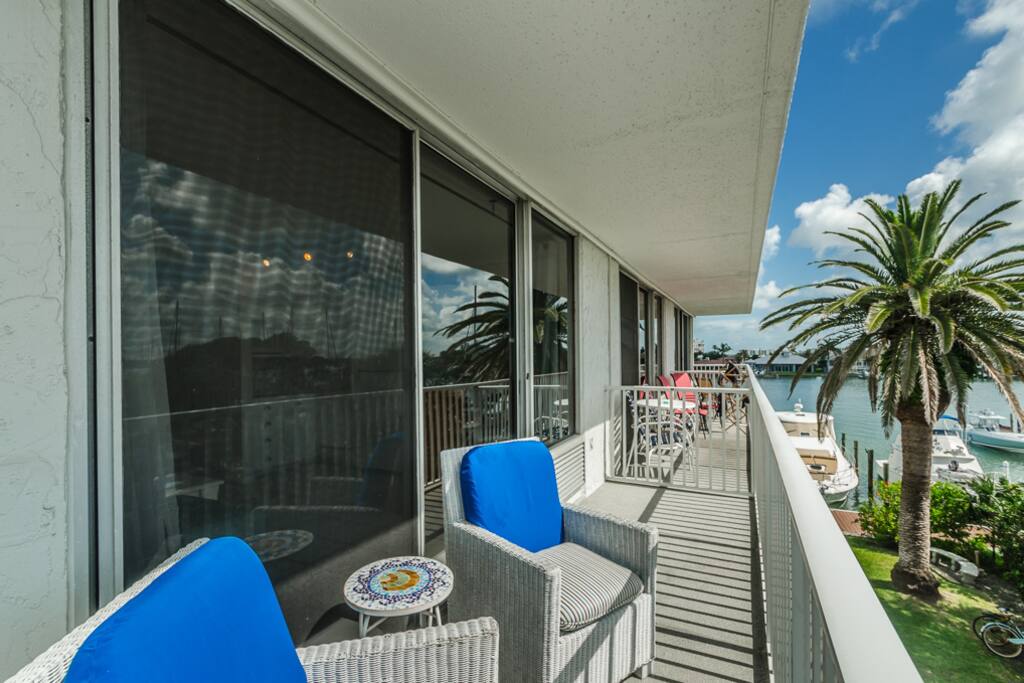 Balcony has 2 softly padded wicker chairs & a small tiled table for morning coffee or tea time.