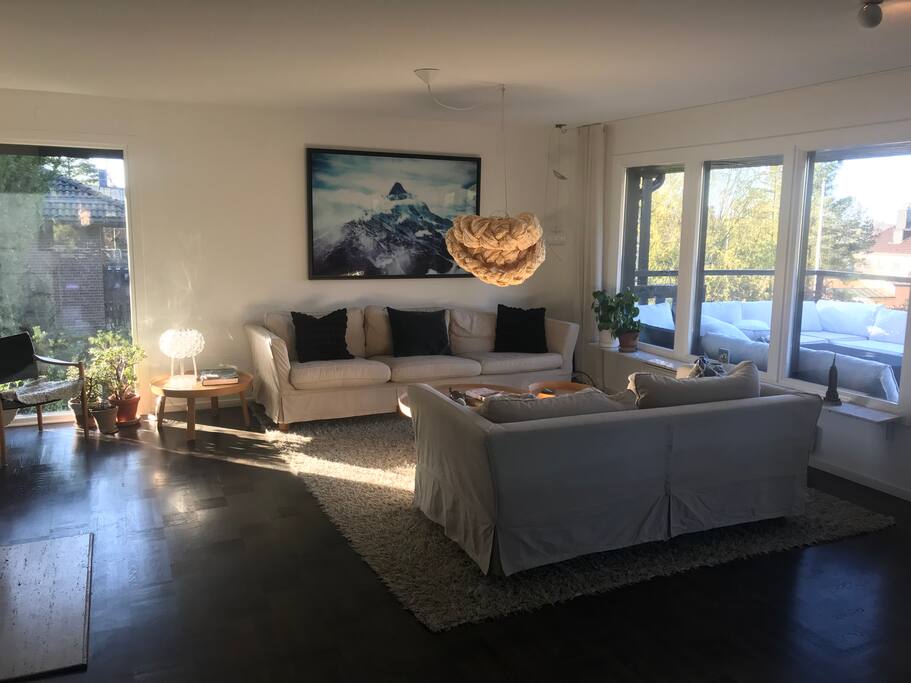 Main room: Sofas, open fire and access to the balcony.