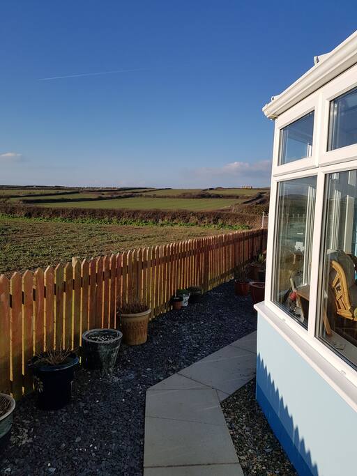 Looking past the conservatory to the hill.