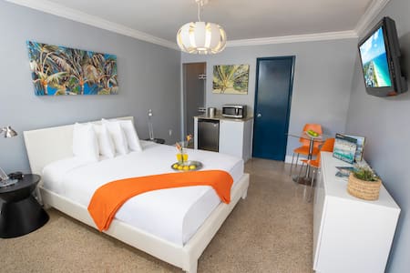 Two Peas in a Pod Accommodations with Queen Bed Just Steps from the Beach