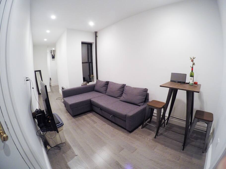 This is the living room. Please ignore our TV stand. :)