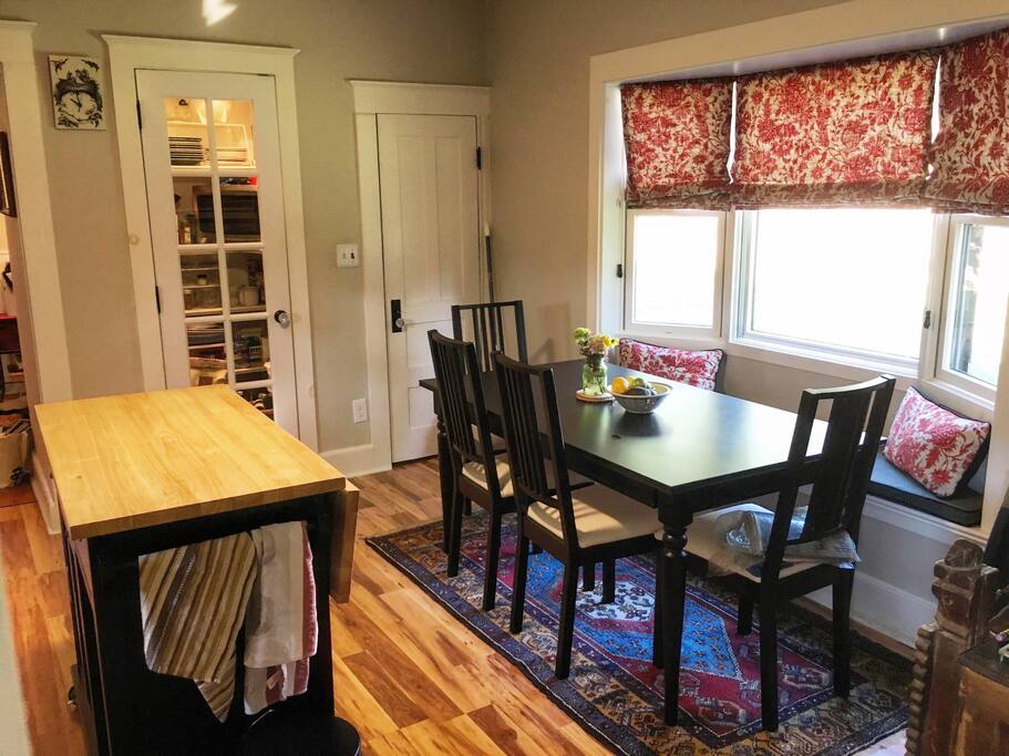 Large dining area/workspace with great natural light.