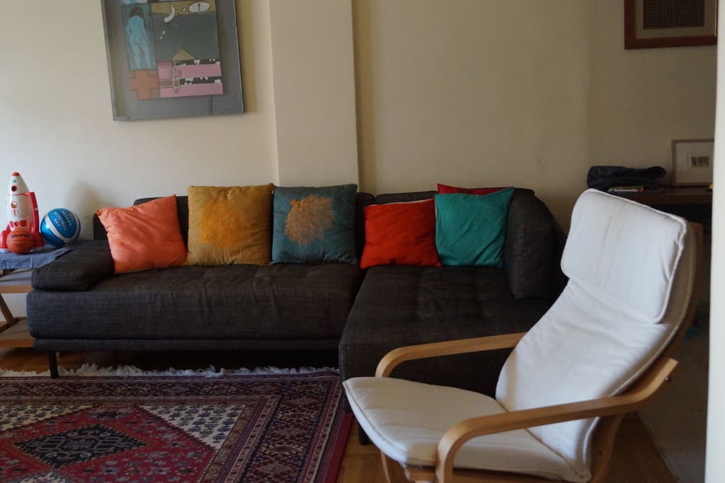 Comfortable central room with Habitat sofa, tv and piano