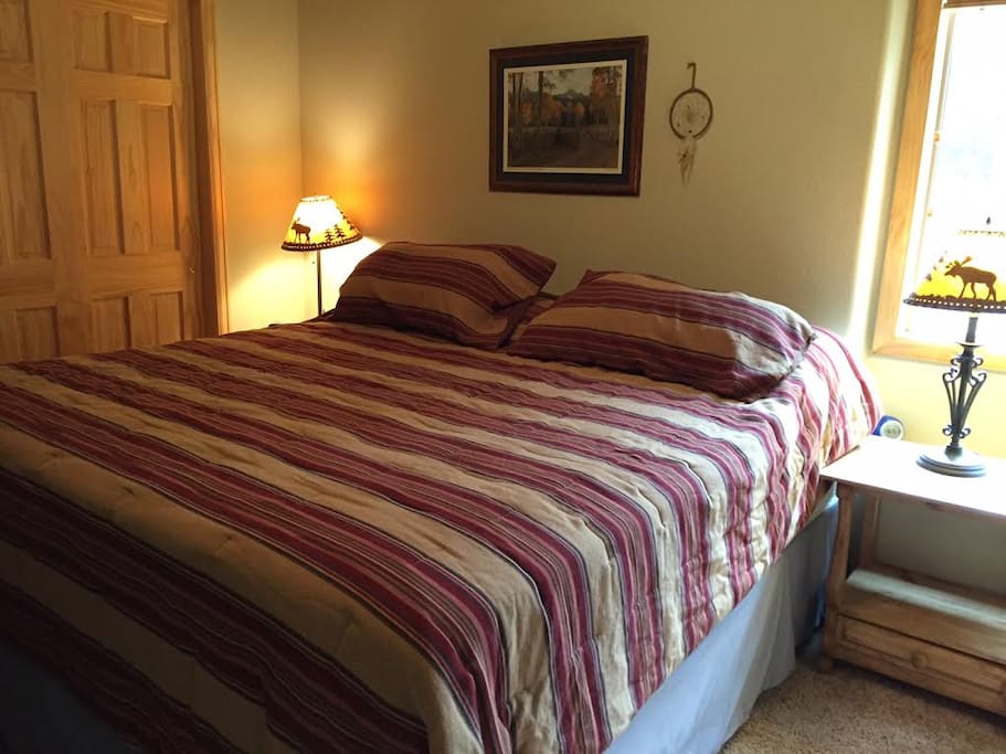Private room with king size bed with 3" foam mattress topper