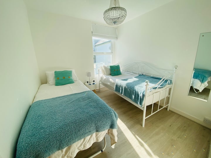 Bedroom 2. Two single beds with brand new luxury mattresses.