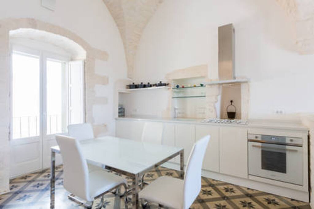 Fully equipped designer kitchen and dining area