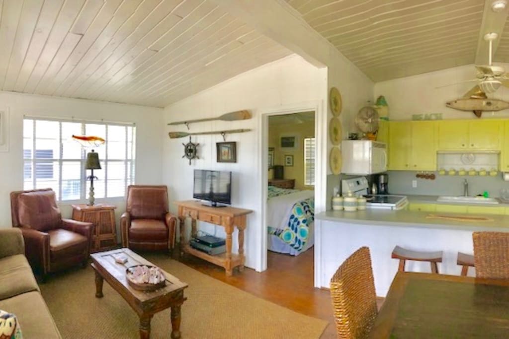 Entrance view of open concept living area and kitchen.