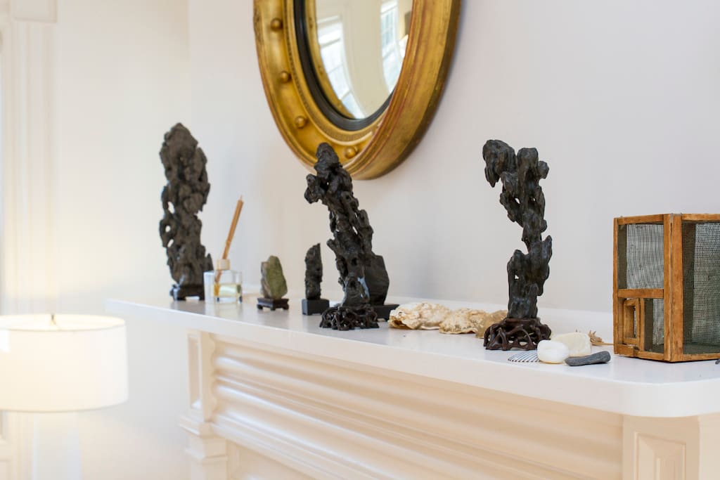Asian artwork over the mantle