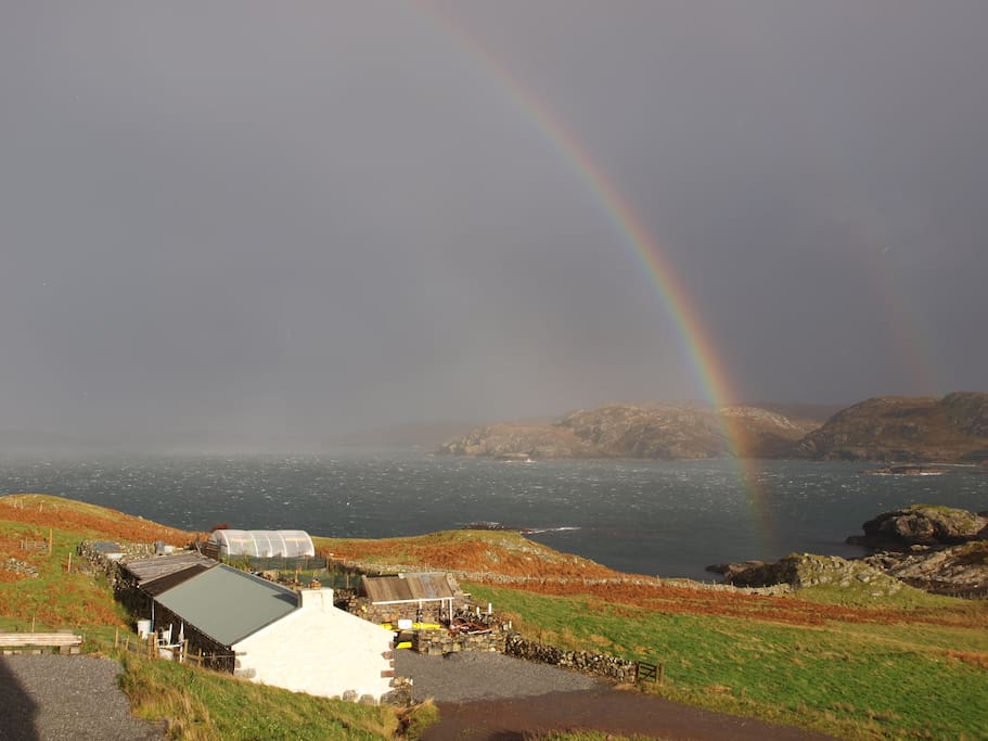 The Bothy with a rainbow over Clashnessie Bay