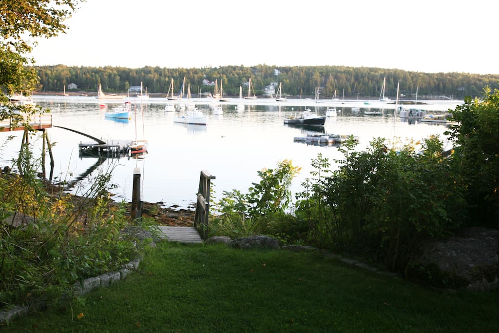 Let the kids explore the rocky beach while you relax on the dock