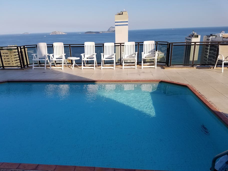 Rooftop pool with mountain and ocean view